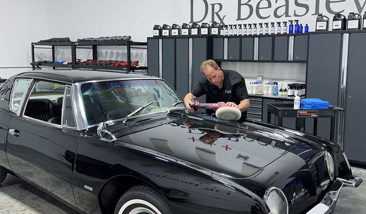 Compounding black car paint